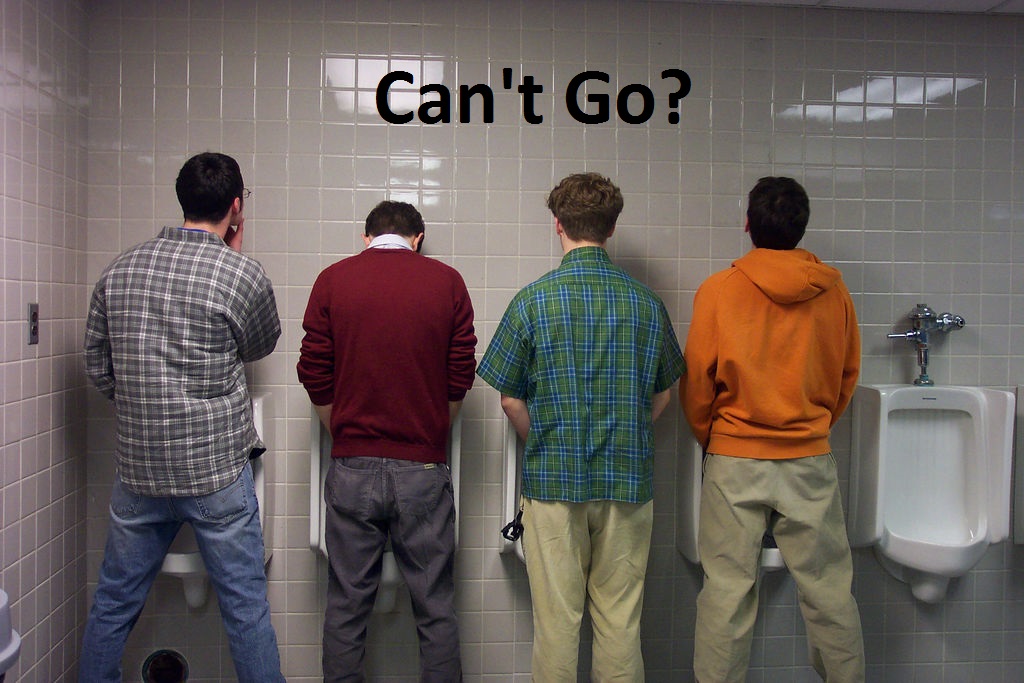 men trying to use the restroom